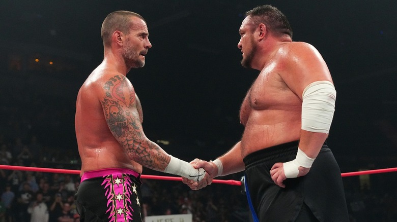 CM Punk and Samoa Joe shake hands