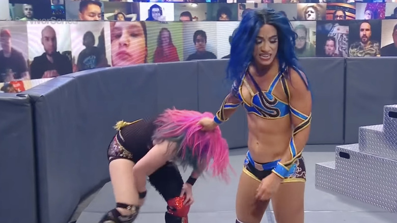 Sasha Banks grabs Asuka's hair