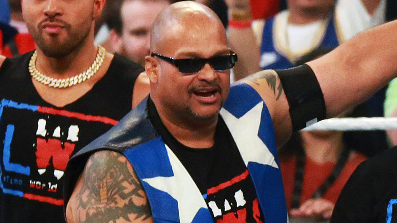 Savio Vega wearing black sunglasses