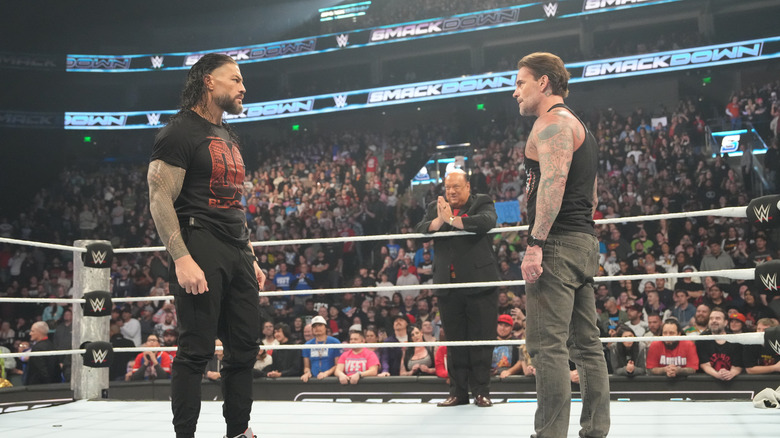 Roman Reigns stares down CM Punk