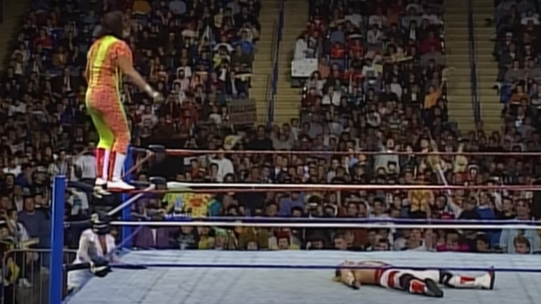 Randy Savage about to diving elbow Shawn Michaels