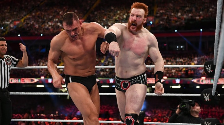 Sheamus throwing a strike at Gunther