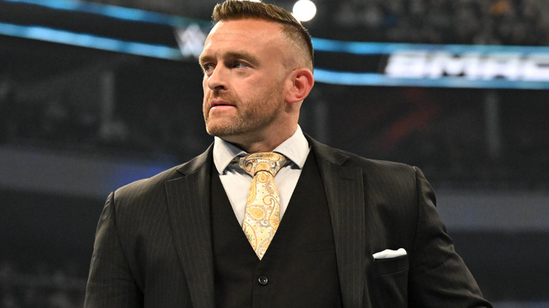 SmackDown General Manager Nick Aldis looks on during WWE SmackDown at Fiserv Forum on November 15, 2024 in Milwaukee, Wisconsin.