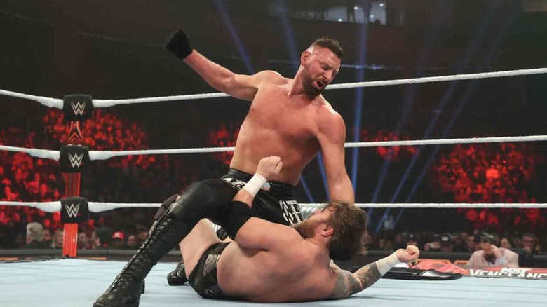 Dijak beats down Joe Gacy in the middle of the ring during a match on "WWE NXT."