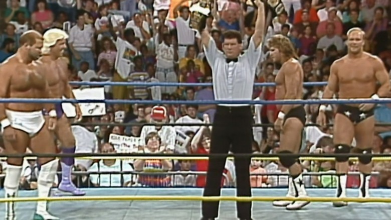 Arn Anderson and Ric Flair in the ring with Steve Austin and Brian Pillman