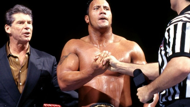 The Rock, Vince McMahon, and Shane McMahon at Survivor Series 1998