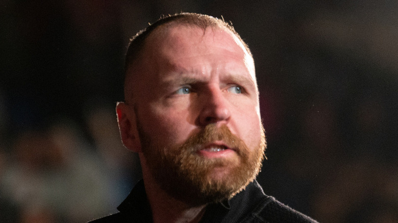 Jon Moxley looks left