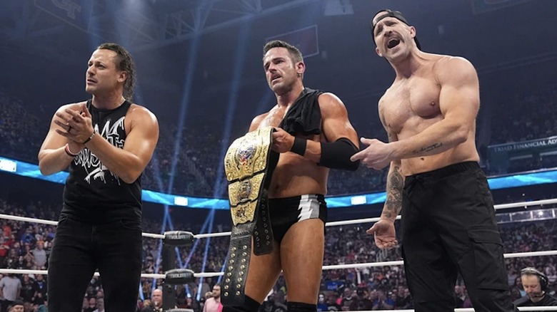 AEW International Champion Roderick Strong with his stablemates, Matt Taven and Mike Bennett.