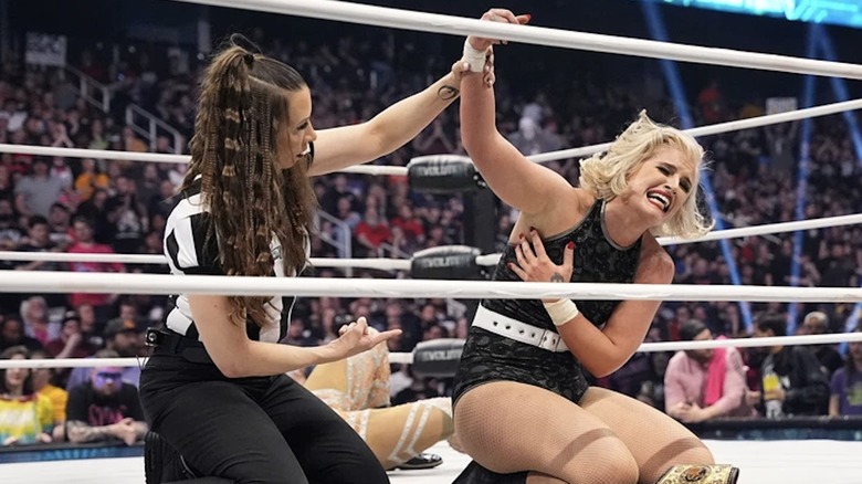 "Timeless" Toni Storm has her hand raised after retaining the AEW Women's World Championship at Revolution.