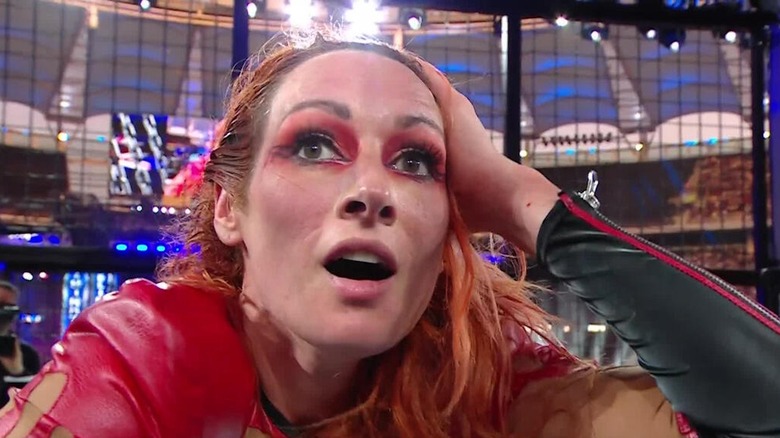 Becky Lynch soaks in her 2024 Elimination Chamber win.