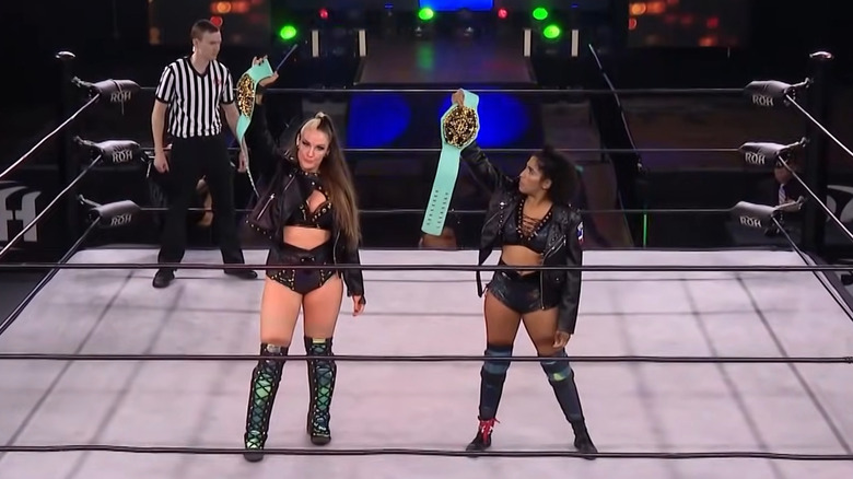 Allysin Kay and Marti Belle show off the NWA Women's Championships in ROH