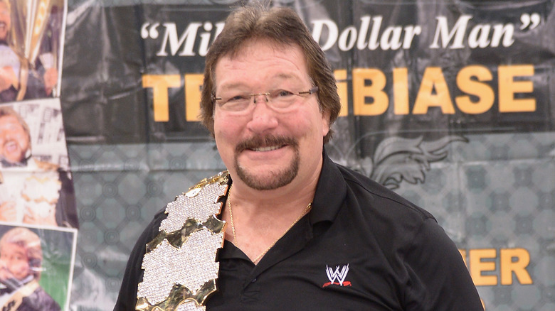 Ted DiBiase holds million dollar title