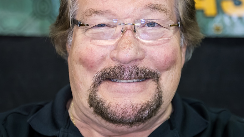 Ted Dibiase smiles