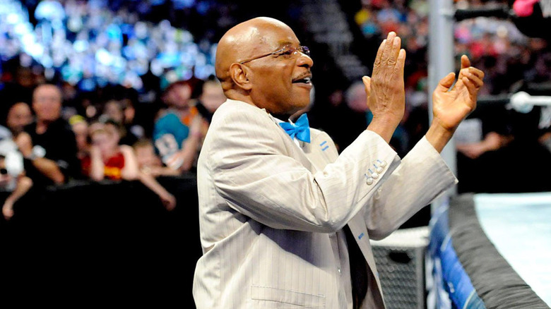 Teddy Long claps