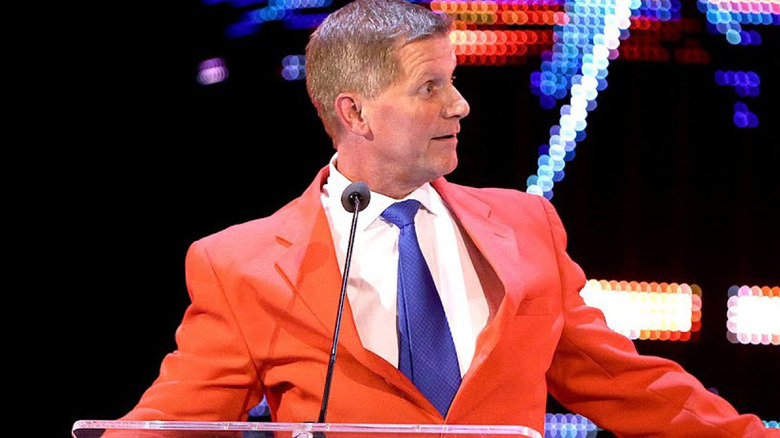 John Laurinaitis looks to the side