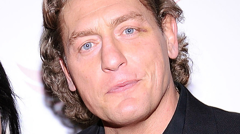 William Regal stares