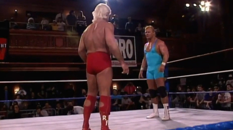 Flair stands opposite Hennig