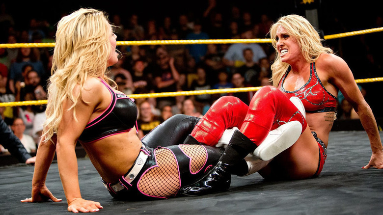 Charlotte locks Natalya in the Figure Four at the first NXT TakeOver