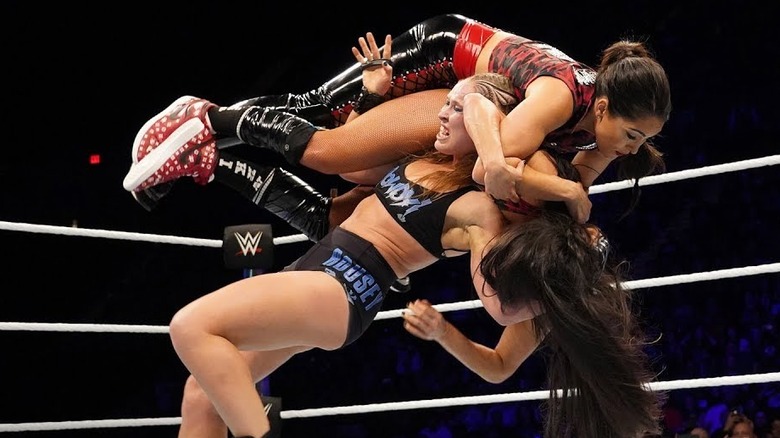 Bellas stacked on Ronda Rousey's Shoulders