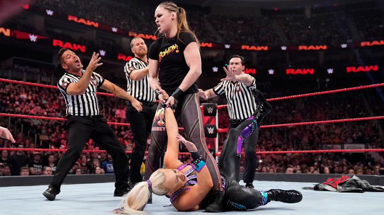 Ronda Rousey Grabs Arm of Dana Brooke