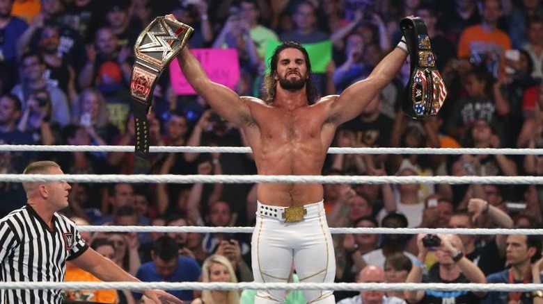 Rollins holds Two Belts