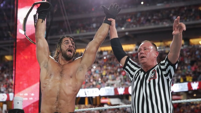 Seth Rollins holds WWE Champsionship