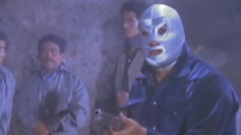 Santo with shotgun