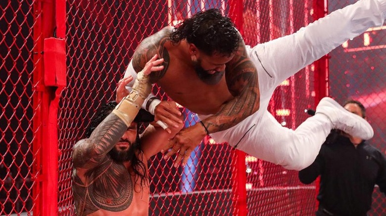 Jey Uso throws himself at Roman Reigns inside Hell in a Cell