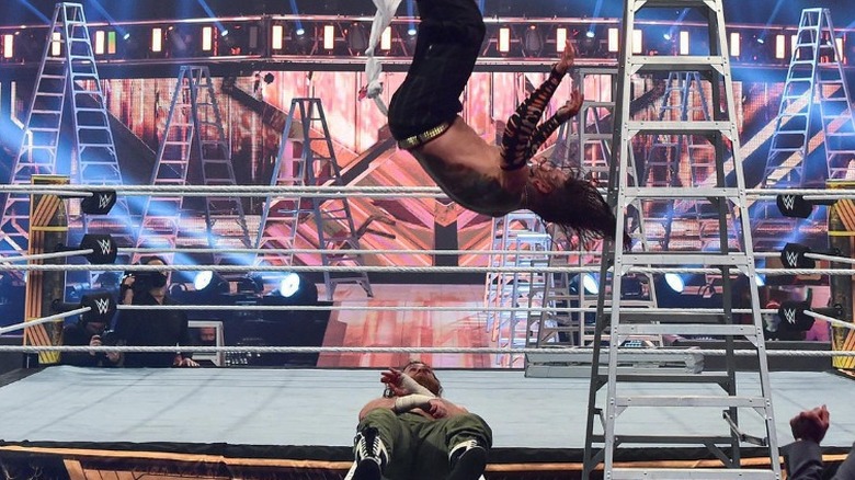 Jeff Hardy hitting a swanton bomb on Sami Zayn