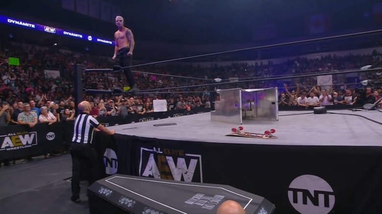 Darby Allin looks down at the coffin on AEW Dynamite