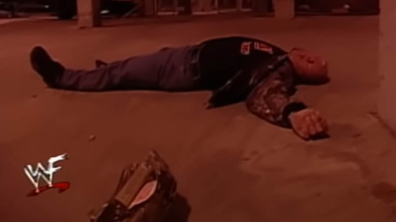 Steve Austin laying on ground