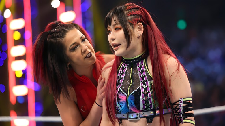 Bayley comforting IYO SKY