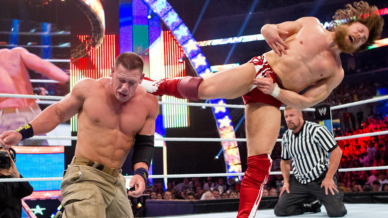 Daniel Bryan kicks John Cena
