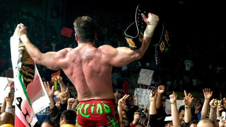 Eddie Guerrero celebrates title win