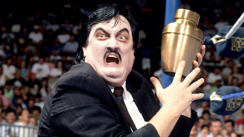 Paul Bearer holding an urn