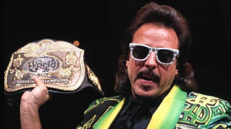 Jimmy Hart holding a belt