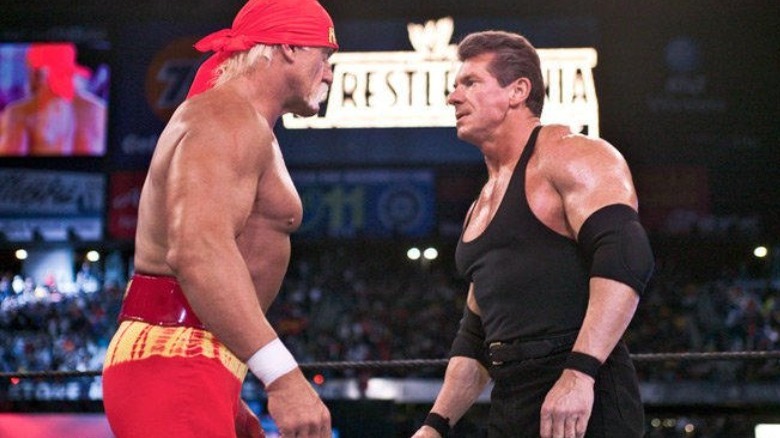 Hulk Hogan looks at Vince McMahon