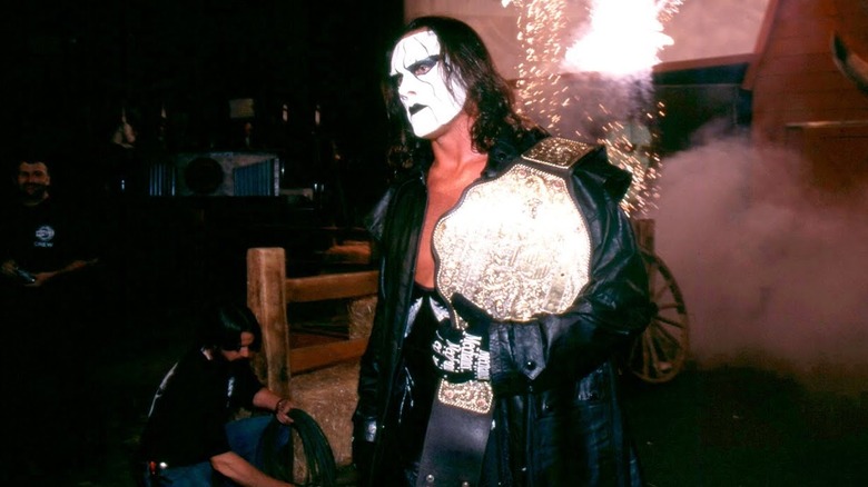 Sting carrying the WCW World Championship