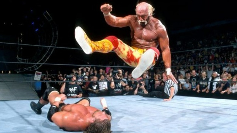 Hulk Hogan hits a Leg Drop on Triple H