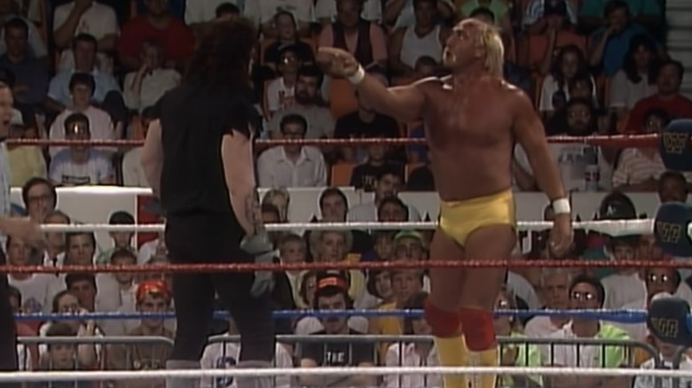 Hulk Hogan pointing at Undertaker