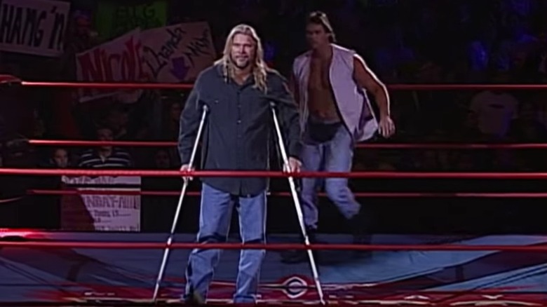 Mike Awesome behind Kevin Nash