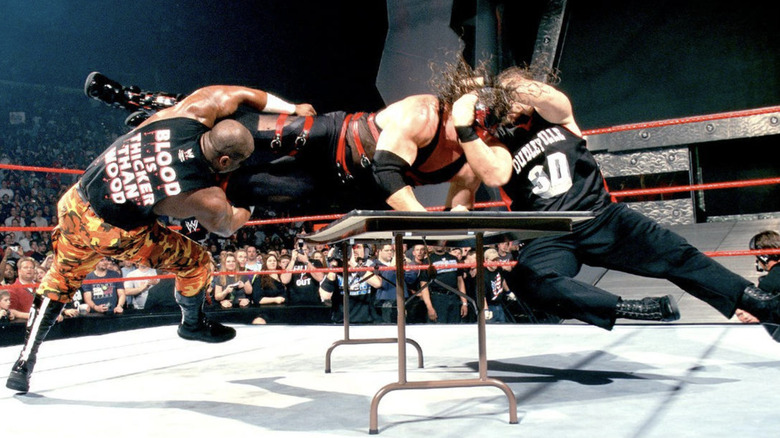 The Dudley Boyz hitting 3D on Kane