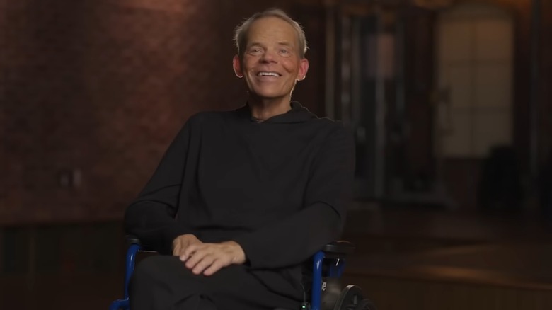 Lex Luger in his wheelchair during his interview with DDP detailing his progress to recovery