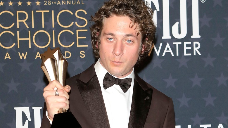 Jeremy Allen White poses with Critics Choice Award