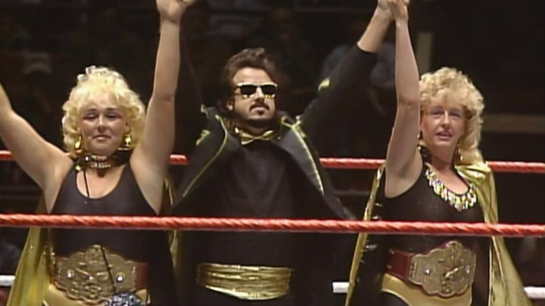 Jimmy Hart celebrating with the Glamour Girls