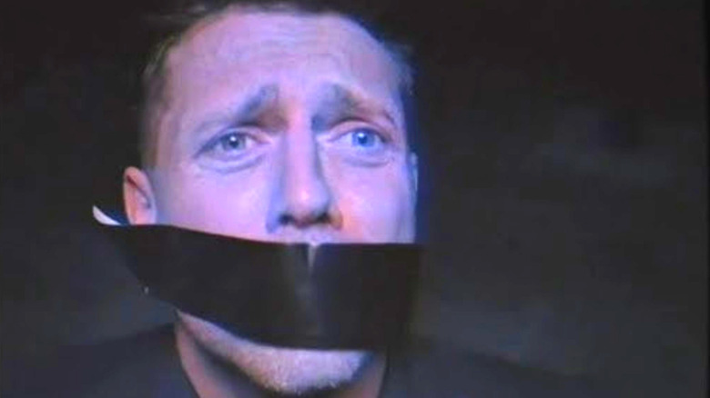 The Miz with tape over his mouth