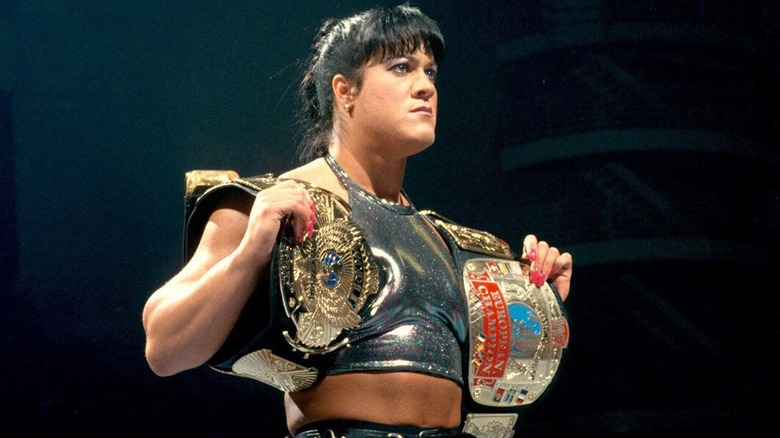 Chyna holding WWE and European Titles
