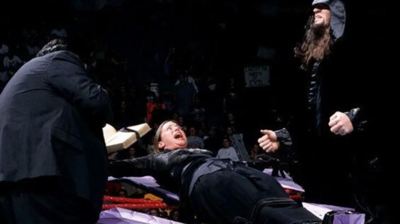 The Undertaker and Paul Bearer attempt a "Black Wedding" ceremony with Stephanie McMahon