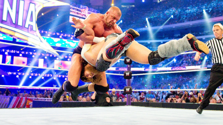 Triple H pedigreeing Daniel Bryan