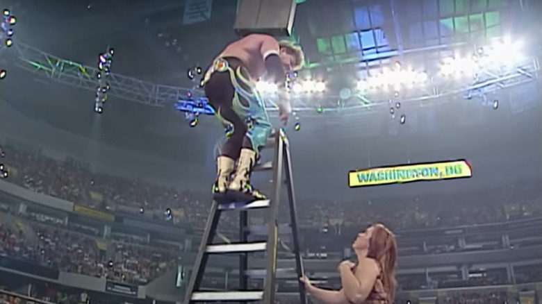 Eddie and Vickie Guerrero by ladder